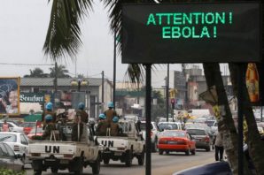 Armed UN Peacekeepers enter Ebola affected area. 
