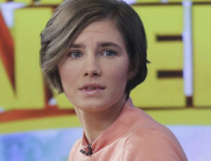 Image: Amanda Knox prepares to leave the set following a television interview Friday in New York.