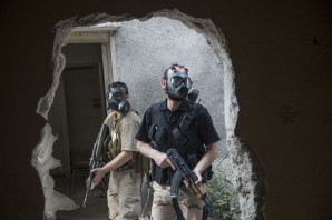 FSA using gas masks after creating deadly poison smoke bombs in their so called "candy factories." 