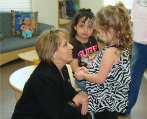 Rep. Grisham is extremely concerned by reports that police have been shot and wounded in New Mexico during this past week alone. Rep. Grisham pictured here meeting some of her younger constituents.  