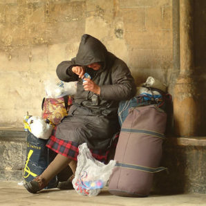 A Homeless, mentally ill woman in America eats what she found from a near by garbage can . Poverty in America is real. Congress can't or won't really deal with that issue. 