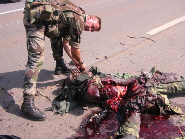 "Mr. Speaker, today, as Congress focuses on the government shutdown, our Nation quietly marks the close of our 12th year at war in Afghanistan", said Rep. Gabbard. Pictured here: Shocking and gruesome photo of American soldier killed by a car bomb explosion in Afghanistan. 