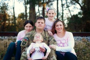 Sgt. 1st Class Forrest W. Robertson, 35, of Westmoreland, Kan., died Nov. 3, in Pul-E-Alam, Afghanistan. Pictured here with his wife and children in Kansas (courtesy Facebook).  