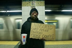 Uninsured Homeless man in America begs people for help - so he can get medical care. For him and millions of other s Obamacare may not come soon enough. 