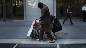 Homeless, unemployed black man in the state of Maryland walks down the street...
