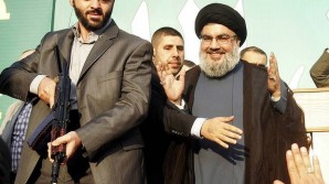 Lebanon's Hezbollah leader Sayyed Hassan Nasrallah greets his supporters at an anti-US protest. Photo: Reuters Read more: http://www.smh.com.au/world/hezbollah-warning-grave-consequences-if-full-antiislam-film-is-released-20120918-2630s.html#ixzz2kiVsHOWk