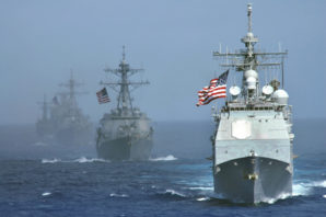 The USS Cowpens (CG 63) leads the formation of USS Lassen (DDG 82), USS John S. McCain (DDG 56), USS Vandegrift (FFG 48) and USNS Tippecanoe (T-AO 199) in the Western Pacific Ocean on June 18, 2006, to start exercise Valiant Shield 2006. The joint exercise consists of 28 naval vessels including three carrier strike groups and more than 300 aircraft and approximately 20,000 service members from the Navy, Army, Air Force, Marine Corps and Coast.   DoD photo by Airman Benjamin Dennis, U.S. Navy. (Released). 