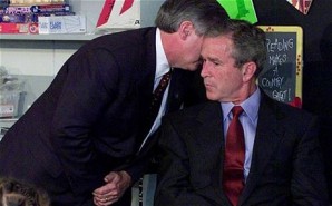 President Bush being informed of the 9-11 attacks by his chief of staff in Florida classroom.  