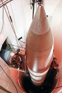 The LGM-30 Minuteman is a United States land-based intercontinental ballistic missile (ICBM), in service with the United States Air Force Global Strike Command. As of 2010, the LGM-30G Minuteman III version is the only land-based ICBM in service in the United States. Each missile carries up to three nuclear warheads, which have a yield in the range of 300 to 500 kilotons. It has a range of over 8,100 -10,000 miles (Exact is Classified)  miles (13,000 km). The current US force consists of 450 Minuteman-III missiles[6] in missile silos around Malmstrom AFB, Montana; Minot AFB, North Dakota; and of course F.E. Warren AFB, Wyoming. 
