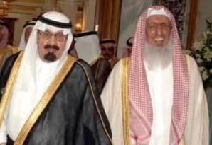 The Grand Mufti of Saudi Arabia laughs it up with his buddy the King. The Mufti's recent statements about destroying Christian churches highlight the need for abolishment of Wahabbism - which is the official religion of Saudi Arabia today. Saudi Arabia press photo. 