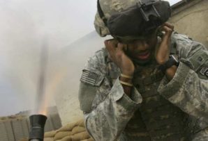 US mortar man , assigned to a front line infantry unit in Afghanistan fires off round after round at enemy positions...