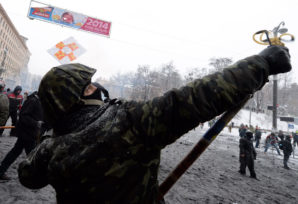 Ukrainian protester clashes with police in Kiev. 