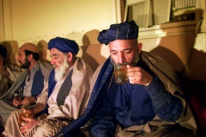 Hamid Karzai drinks tea with Taliban leaders while American forces battle that same group - trying to keep him in power? 