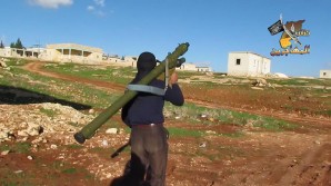 FSA terrorist affiliated with al-Qaeda holds an anti aircraft weapon in Syria. 