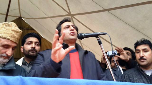 Jammu and Kashmir Peoples Conference (JKPC) chairman Sajad Gani Lone addressing the public meeting  