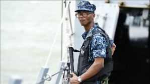 Sailor aboard the USS Kidd - an Arleigh Burke-class destroyer halts search for Malaysian airliner. 