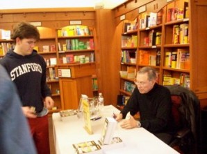 Former CIA spy signed one of his books for a patron at a local bookstore. 