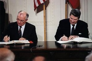 U.S. President Ronald Reagan and Soviet General Secretary Mikhail Gorbachev signing the INF Treaty in the East Room at the White House in 1987. 