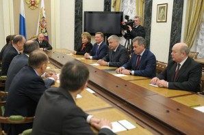 Members of the Security Council in Russia meet at the Kremlin with President Vladimir Putin to discuss US sanctions, aggression and the situation in Crimea. 