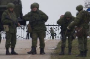 Russian troops in Crimea guard a Ukrainian air base. 