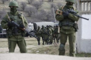 Russian troops swarm near a location of a Ukrainian military site in Crimea. 