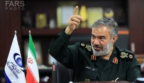 Commander of the Islamic Revolution Guards Corps Navy Rear Admiral Ali Fadavi underlined the IRGC's full preparedness to defend Iran's interests in the strategic Strait of Hormuz and the Persian Gulf, and warned that firing even one bullet at the country will burn the entire world. Picture courtesy of Fars news service in Iran. 