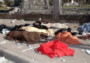 Bodies of innocent victims of a suicide attack (covered by blankets) in Syria lay scattered on the sidewalk. The handiwork of al-Qaeda militants in that country who are the indirect recipients of non lethal U.S. aid, some say. SANA