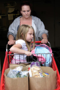 "It is a failure of this institution and our government as a whole that we still tolerate incredibly low wages so that people are forced to choose between rent and food, clothes and food, utilities and food", said Rep. McGovern.  Picture here: Food stamp mom struggles to feed her children on her current allotment of SNAP benefits.