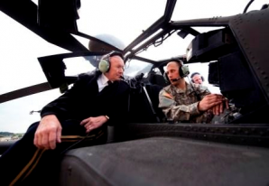 General Dempsey talks with Apache helicopter pilot at Ft. Riley, Kansas in 2012. 