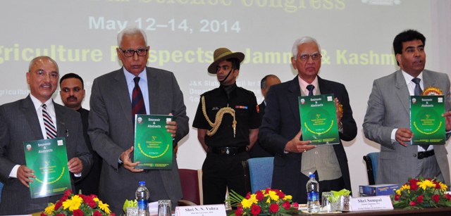 GOVERNOR RELEASING  SOUVENIR OF THE 3RD J&K AGRICULTURAL SCIENCE CONGRESS -