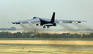 A Boeing B-52 Stratofortress is a long-range, subsonic, jet-powered strategic bomber, used by the United States Air Force that usually carries nuclear weapons. 