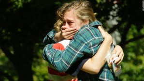 Seattle school shooting tragedy! Picture here: Students react to the news of people murdered in awful assault. 