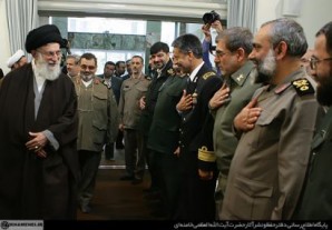 General Hassan Firouzabadi stands just behind Ayatollah Khamanei as he walks into the meeting hall to discuss issues with senior level military commanders in Iran.  Firouzabadi is the Ayatollah's most trusted adviser and personal friend. He is a hero of the Iran Iraq war and a brilliant military strategist and tactician. With an IQ at near genius level. 