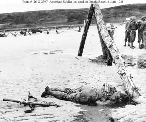 Dead American soldier at Omaha Beach on D-Day. 