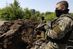 Pro Russian rebels man a position in eastern Ukraine