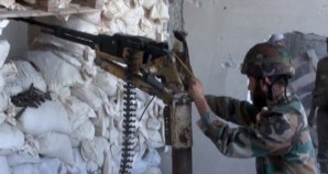 Syrian Army machine gunner blasts ISIS terrorists assaulting a defensive line near Aleppo. 