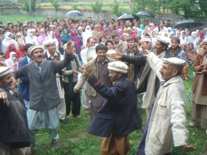 Participants dancing on the eve of 150 KV hydro power house by SRSP