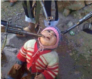 ISIS taunts child before executing him.  