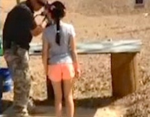 Shooting instructor coaching a young child on shooting a fully automatic Uzi sub machine gun. The girl subsequently lost control of the weapon dropped it and bullets hit the instructor in the head. He died shortly thereafter. The littel girl is traumatized, an entire nation shocked and  and a family is devastated.  