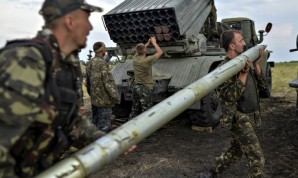 Ukrainian soldiers charge a Grad rocket launcher system in the Luhansk ...