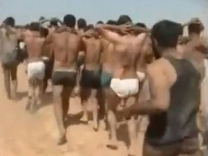 Over two dozen captured Syrian Army soldiers being marched to their death by ISIS fighters in Syria 