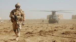 "The two defense leaders then discussed global security challenges and their collaboration on counter-ISIL operations in Iraq. Work commended Canada for its contributions, particularly in conducting air strikes against Islamic State of Iraq and the Levant (ISIL) targets, and the delivery of humanitarian aid to Kurdish forces in Northern Iraq", according to the Pentagon release. Pictured here: A lone Canadian soldier stands guard at remote landing site in Afghanistan. 