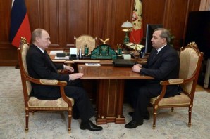 Putin with Minister of Civil Defense, Emergencies and Disaster Relief Vladimir Puchkov. December 27, 2014