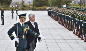 Japan's new Defence Minister Gen Nakatani reviews troops. 