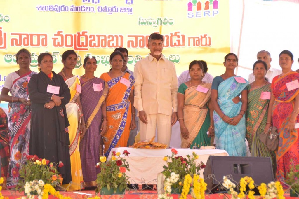 Chief Minister of Andhra Pradesh Mr. Nara Chandra Babu Naidu, in a group photo with self-help groups in Shatipuram Mandal, Chittoor District on 24-02-2015. 