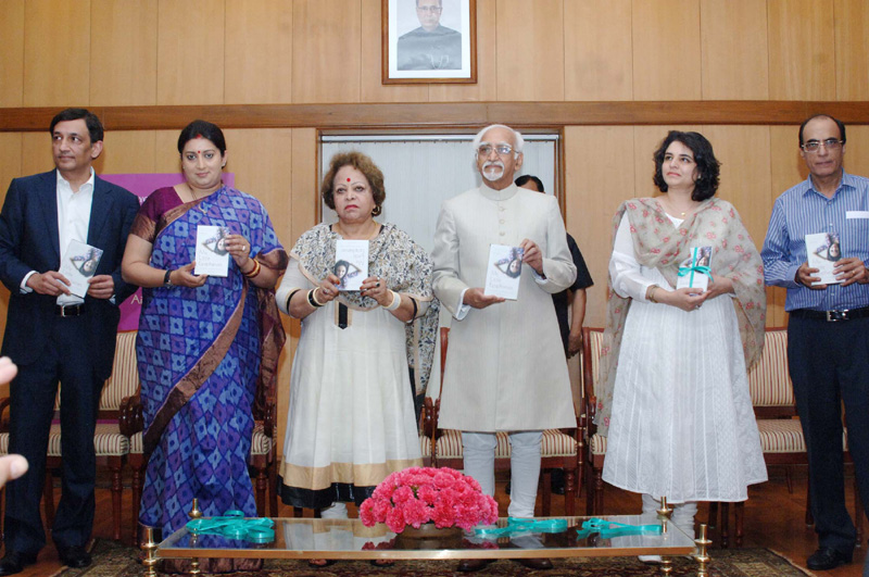 The Vice President, Mr. Mohd. Hamid Ansari releasing a book entitled “My Little Epiphanies”, written by Late Ms. Aisha Chaudhary, in New Delhi on April 13, 2015. Mrs. Salma Ansari and the Union Minister for Human Resource Development, Mrs. Smriti Irani are also seen.
