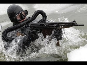 Russian Special forces with specially adapted machine gun for use in and out of the water. 