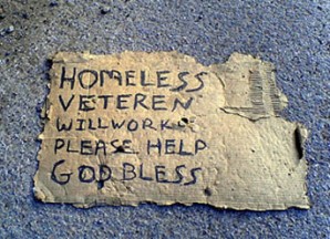 A discarded sign held by a homeless veteran in Phoenix , Arizona panhandling for change . 