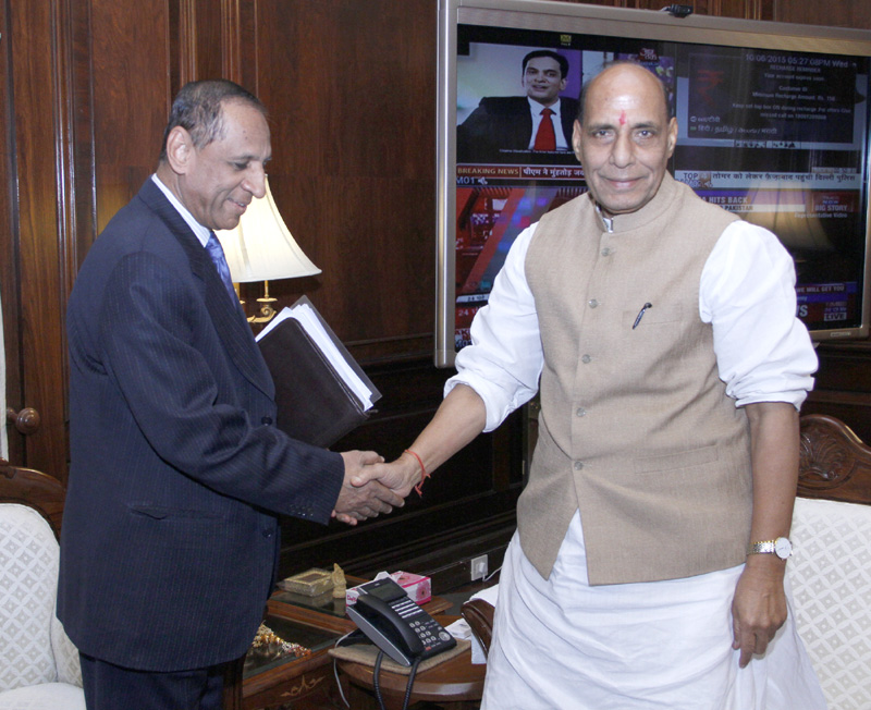 The Governor of Andhra Pradesh and Telangana, Mr. E.S.N.L. Narasimhan calling on the Union Home Minister, Mr. Rajnath Singh, in New Delhi on June 10, 2015.