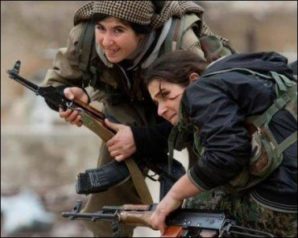 Female Kurdish fighters engaged in combat with ISIS in Jan 2015. 